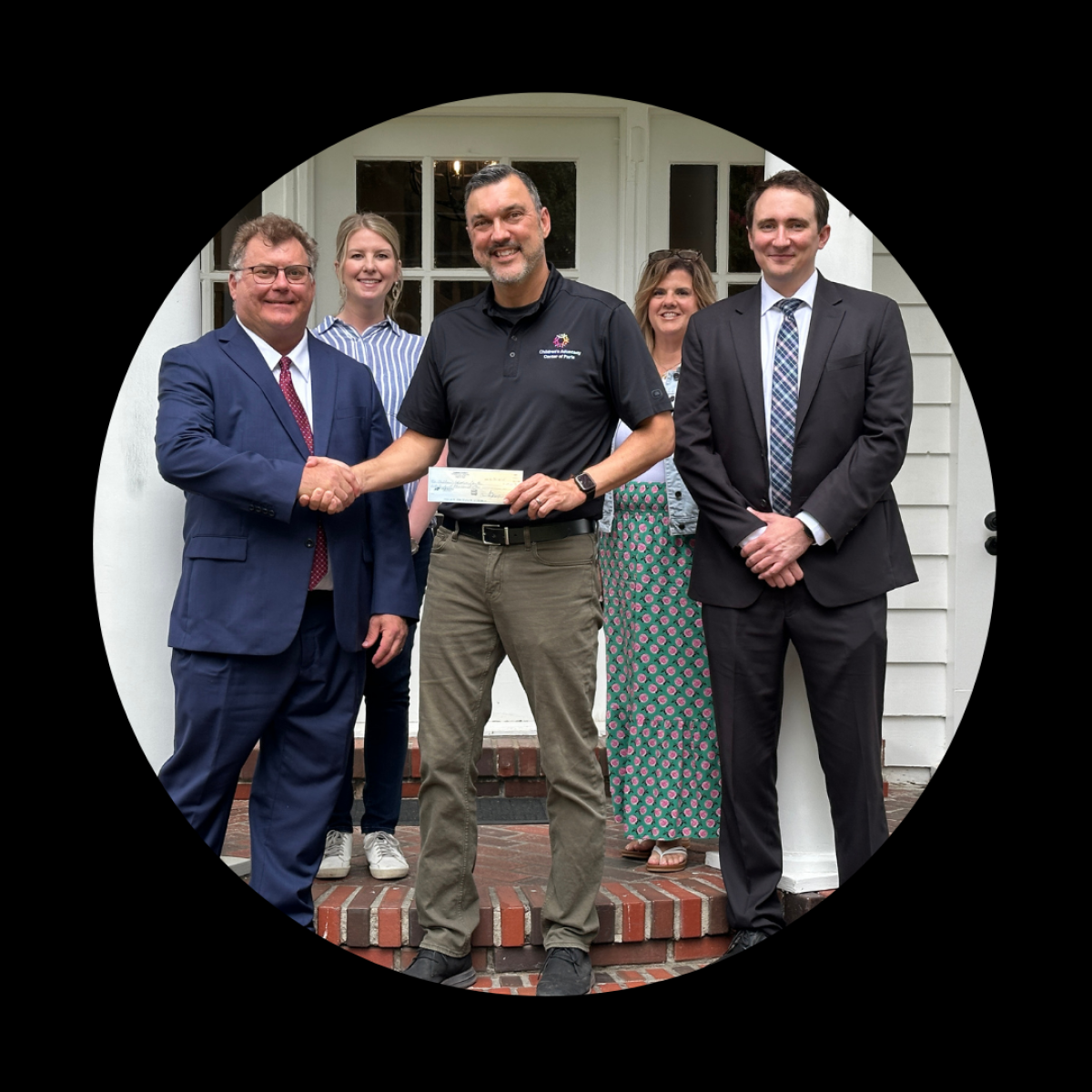 On behalf of the Lamar County District Attorney’s office, Gary Young and Nick Stallings are proud to present a donation to the Children’s Advocacy Center of Paris.Pictured: Gary Young, Lindsey Severson, Greg Kee, Reisa Holzwarth, and Nick Stallings.